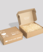 Cardboard box with filling
