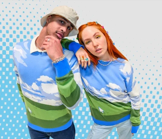 Ugly holiday sweater from Microsoft features the Windows XP “Bliss” desktop image. (Microsoft Photo)